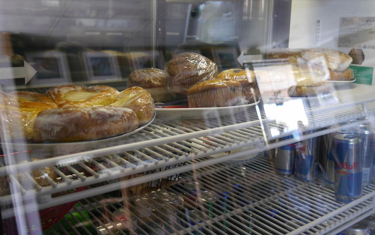 Danishes and muffins in the pastry case